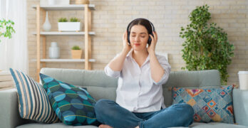 woman-listening-to-music-YNKX8Q6